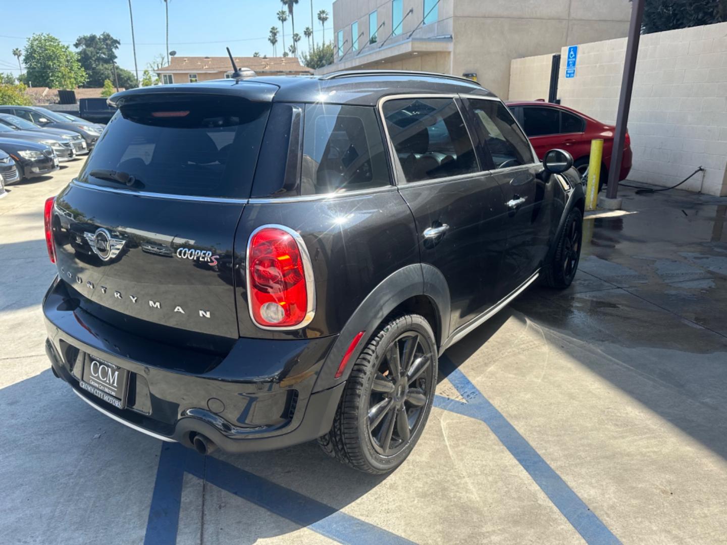 2015 Black /Black Mini Countryman S (WMWZC3C54FW) with an 1.6L L4 DOHC 16V TURBO engine, Automatic transmission, located at 30 S. Berkeley Avenue, Pasadena, CA, 91107, (626) 248-7567, 34.145447, -118.109398 - Photo#5